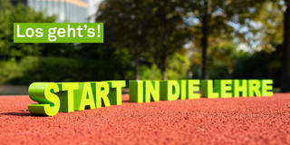 Schriftzug „Start in die Lehre“ auf einer Tartanbahn